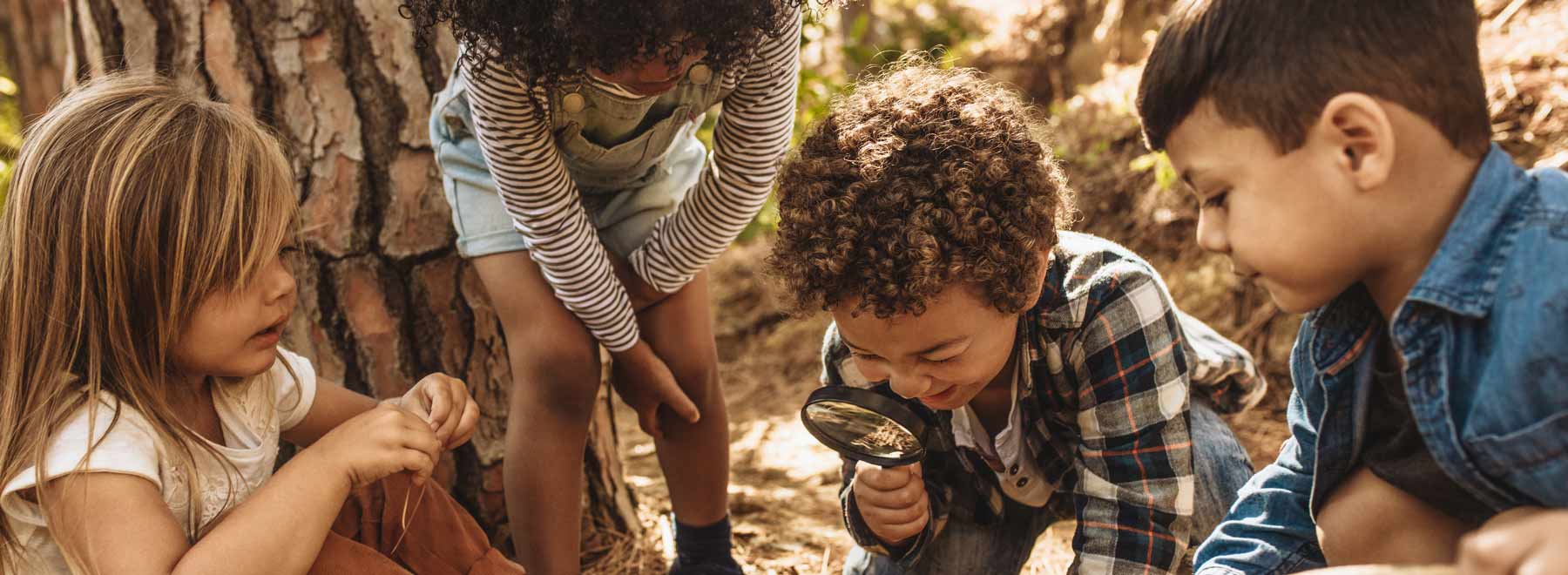 Children play in the dirt.
